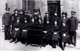 Salvation Army Songsters in High Street. Jane Wigley far left front row, Irene Pyatt behind her.
